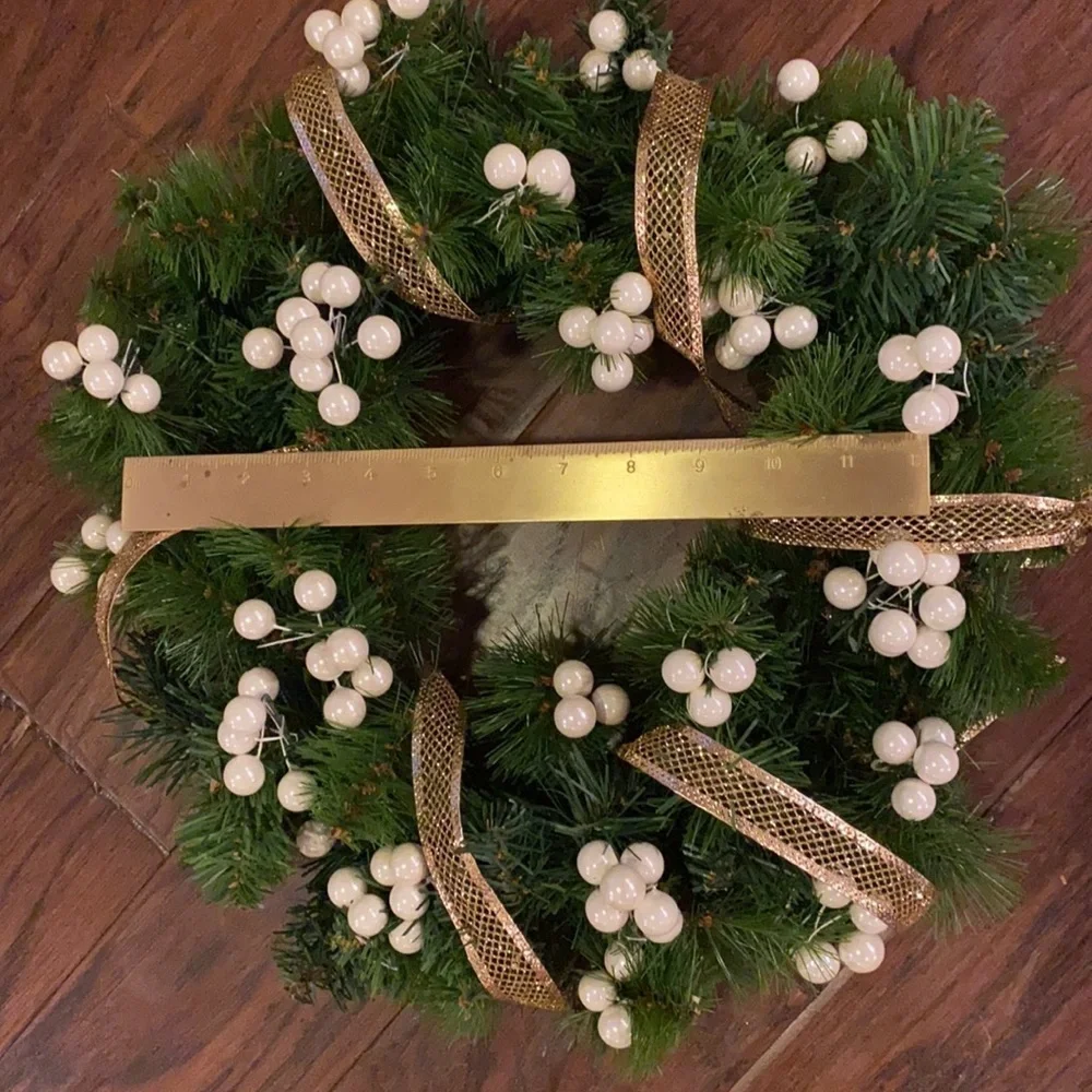 Green Holiday Wreath 15” across 10” wreath base includes gold ribbon pearl balls
